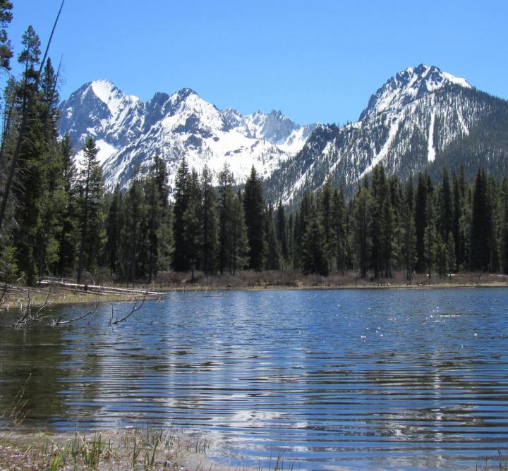 Lake with mountains in the background